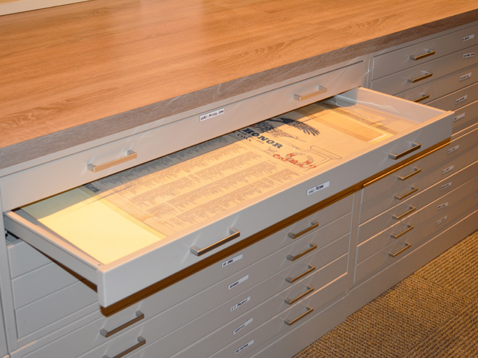 medium wood laminate top and side panel flat file cabinet for museum